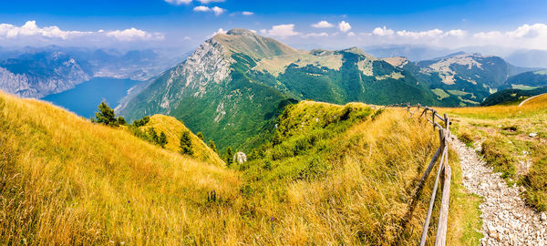 Panoramic view of landscape against cloudy sky