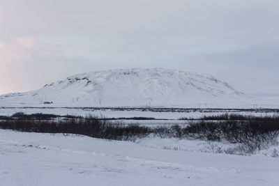 Scenic view of snowcapped mountain against sky