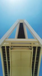 Low angle view of building against clear blue sky