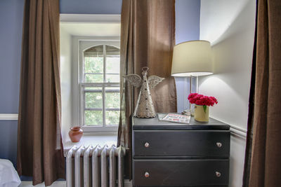 Potted plants on window sill