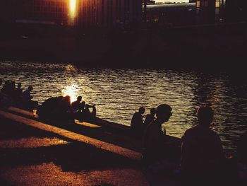 River in city at sunset