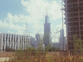 Panoramic view of factory against sky