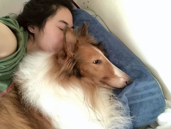 Woman with dog at home