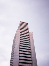 Low angle view of modern building against sky