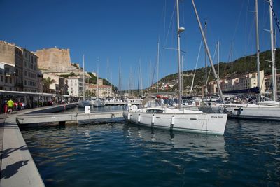 Sailboats in city