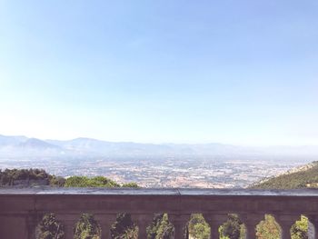 Scenic view of city against clear sky