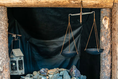 Old rusty metal hanging on rope