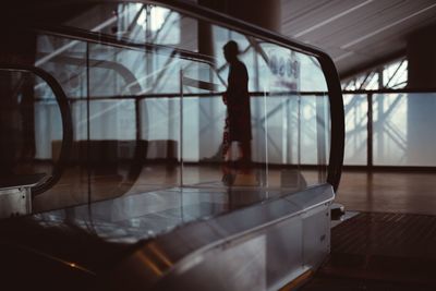 Reflection of person on glass