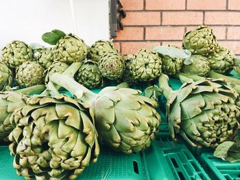 Close-up of artichokes for sale at market stall