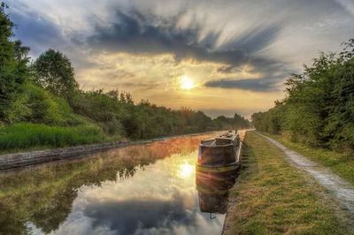 Scenic view of sunset over river