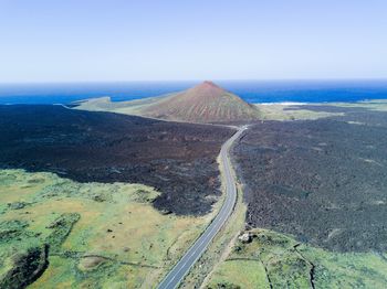 Aerial view of road passing through landscape