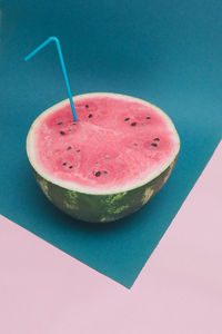 High angle view of fruits against blue background