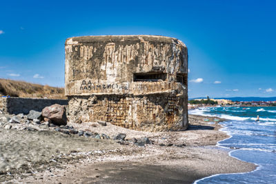 View of old ruin on beach