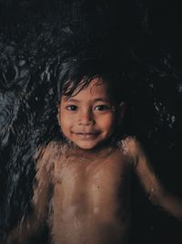 This is a photo of my nephews who are very happy when they bathe in the river
