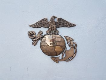 Close-up of decoration hanging against wall