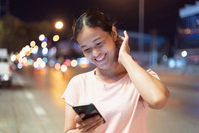 Young man using mobile phone