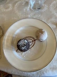 Close-up of wedding rings on table