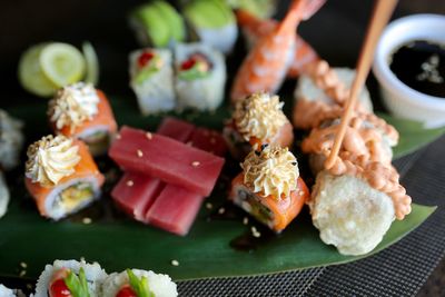 Close-up of sushi served on table