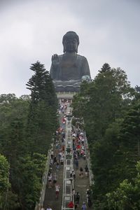 Low angle view of statue against sky