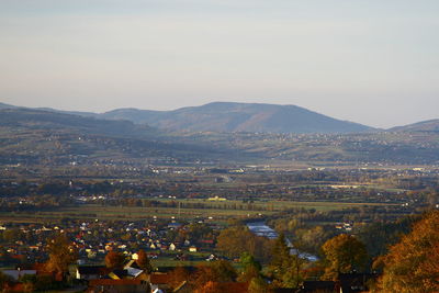 Aerial view of landscape and mountains against sky