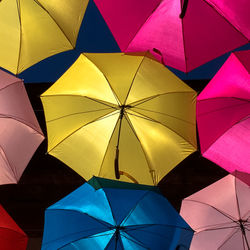 Low angle view of multi colored umbrella