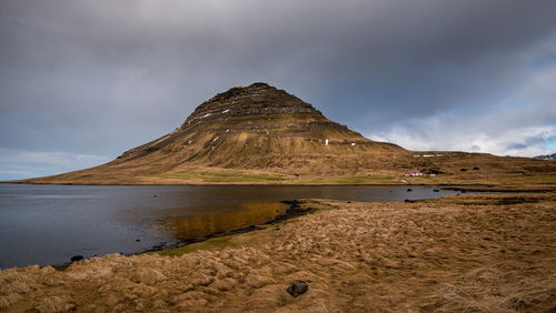 Scenic view of lake and mountain against sky