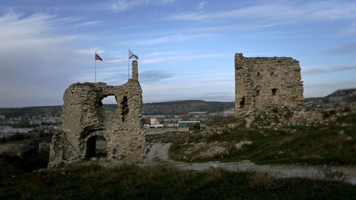 Old ruins against cloudy sky