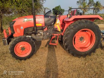 Close-up of tractor on field