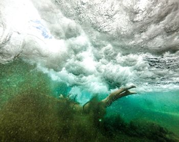 Man swimming in sea