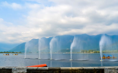 Scenic view of a fountain on sea against sky