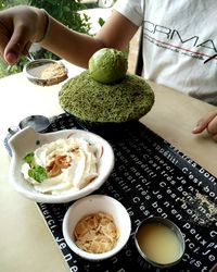 Close-up of hand holding food