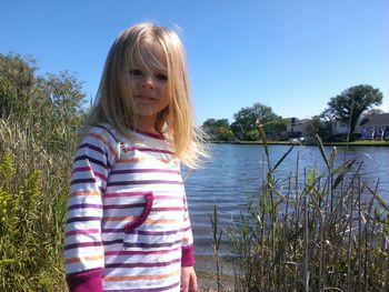 Portrait of young woman in water