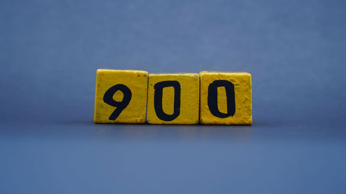 Close-up of toy blocks on blue background