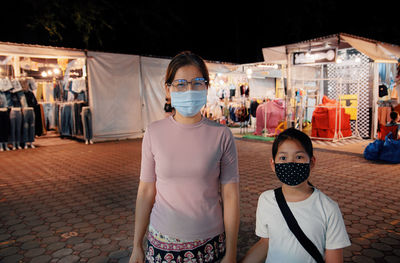 Mother and daughter shopping together during covid-19 disease 