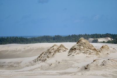 Scenic view of desert against sky