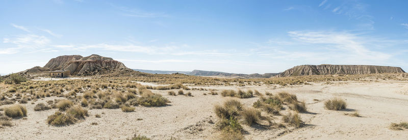 Scenic view of desert against sky