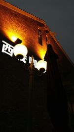 Low angle view of illuminated street light