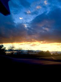 Scenic view of landscape at sunset