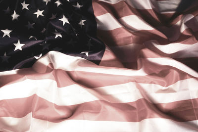 High angle view of flag on bed