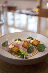 Close-up of food served on table