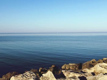 Scenic view of sea against clear sky