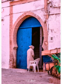 Chair in front of old building