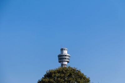 Low angle view of tower against clear blue sky