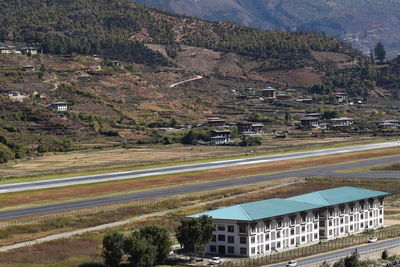 High angle view of buildings by road