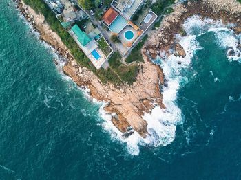 High angle view of swimming pool by sea