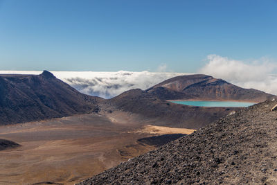 Scenic view of volcanic mountain against sky