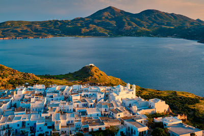 View of plaka village on milos island on sunset in greece