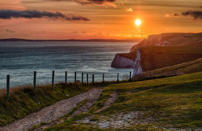 Scenic view of sea against sky during sunset