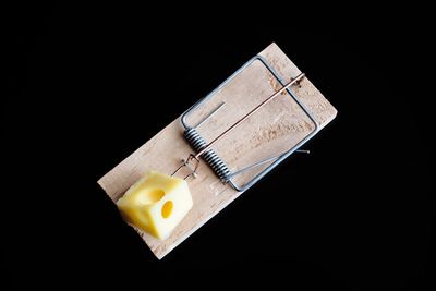 High angle view of breakfast on table against black background