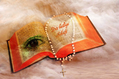 High angle view of text on paper on table